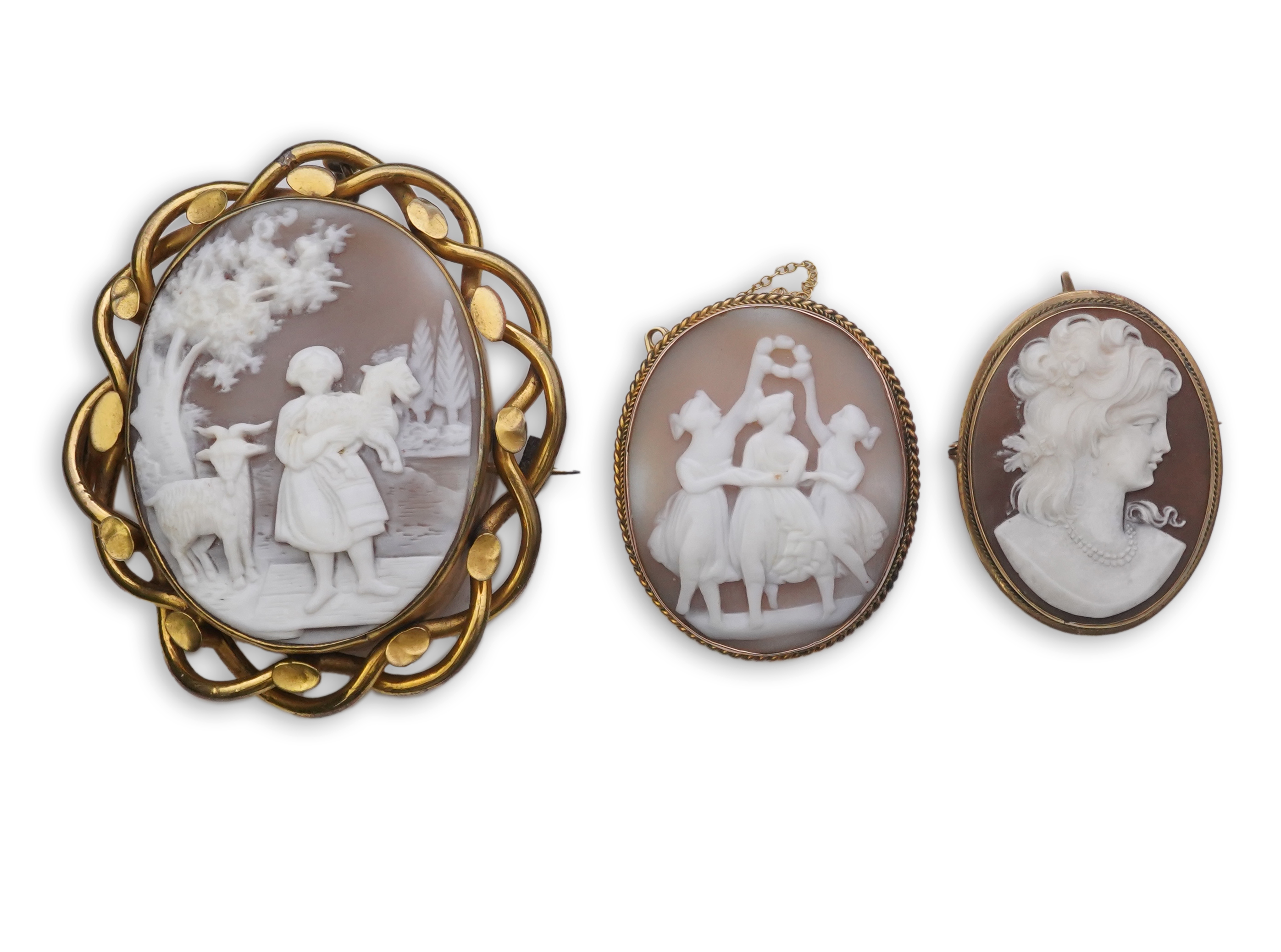 Three shell cameo brooches, 20th century